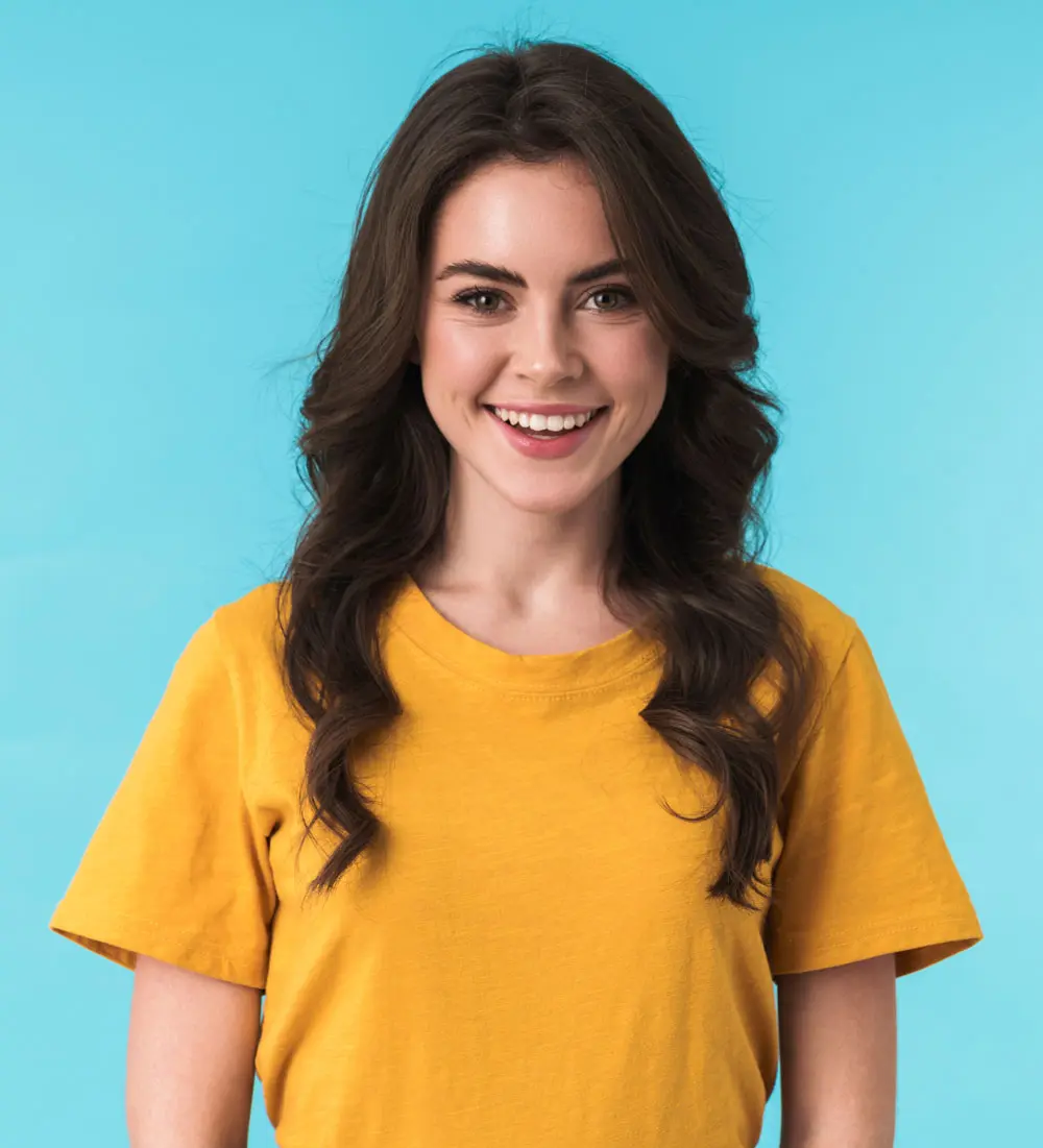 teen girl with curly hair smiling in background