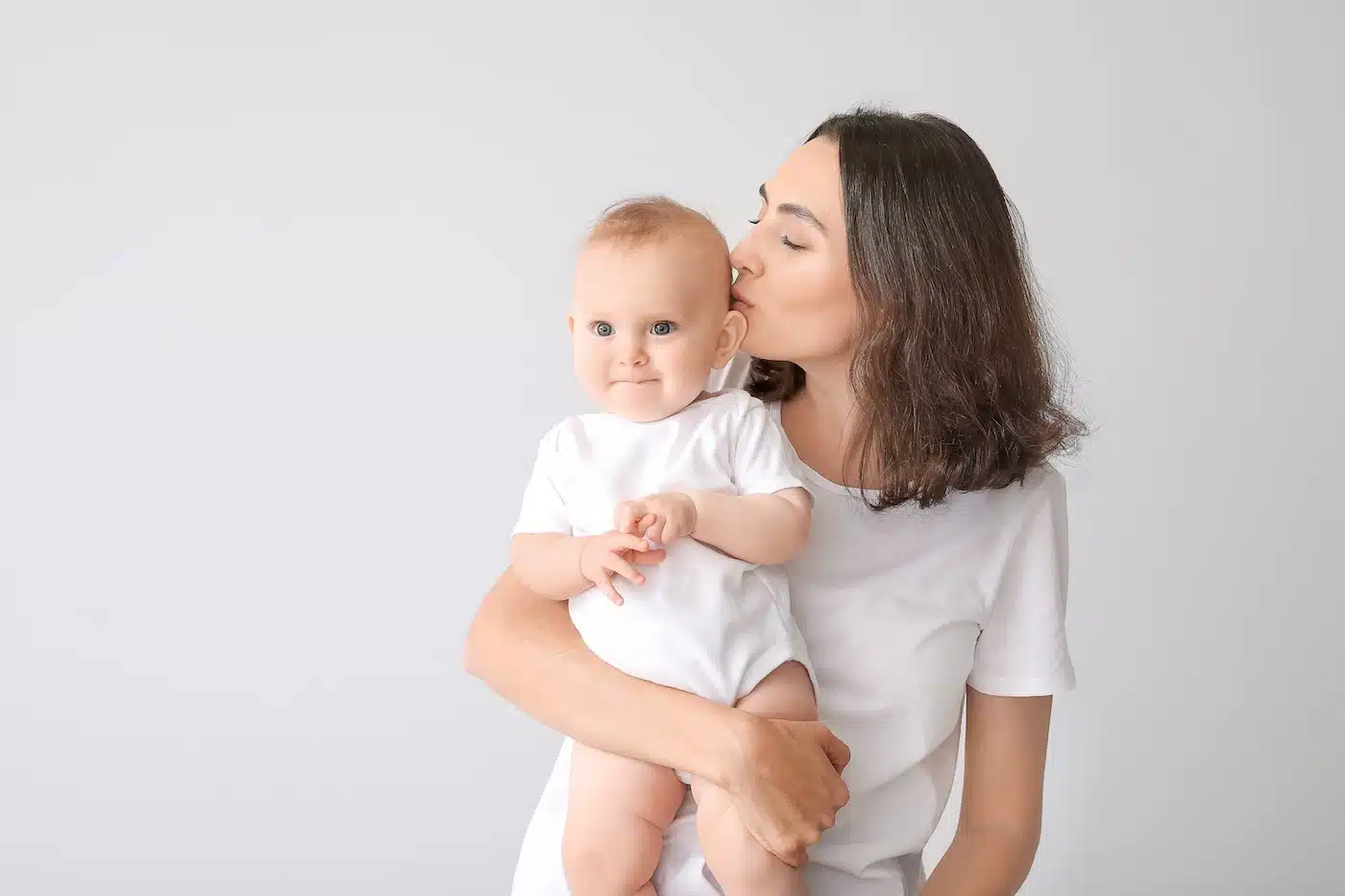 beautiful happy mother with her baby